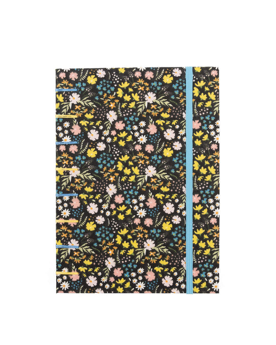 Cuaderno Cosido Copto Artesanal Florecitas sobre fondo negro cerrado