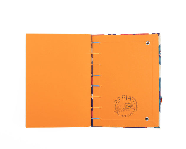 Cuaderno artesanal copto étnico abierto
